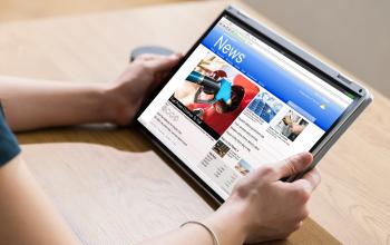 News webpage open on a tablet display